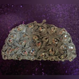 Genuine Mossmon jeweled clutch